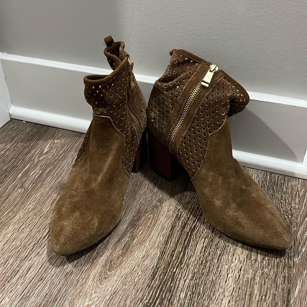 Brown suede booties with gold zipper. Mesh like look